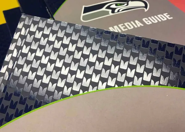 Seattle Seahawks media guide with spot gloss UV pattern on cover