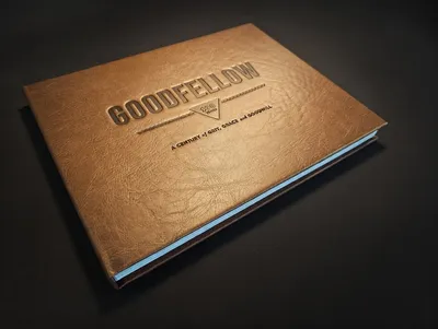 Hardcover book with foil-stamped cover lying open